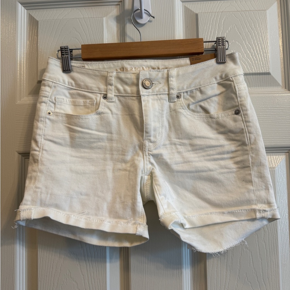 White denim low rise midi length brand new never worn